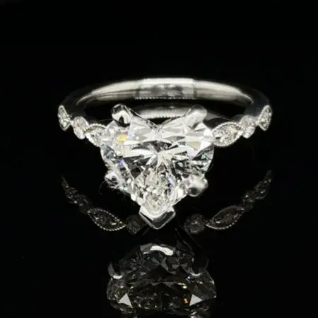 2-carat heart-shaped diamond engagement ring with marquise-pattern accents on a white gold band